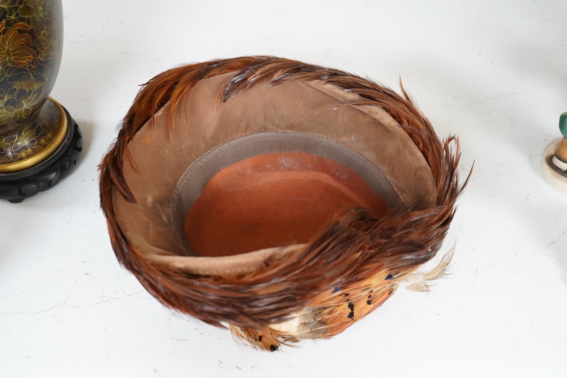 A decorative ladies feather hat